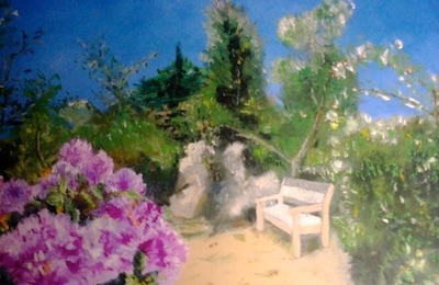 Photo - rhododendron en fleurs et banc de lecture